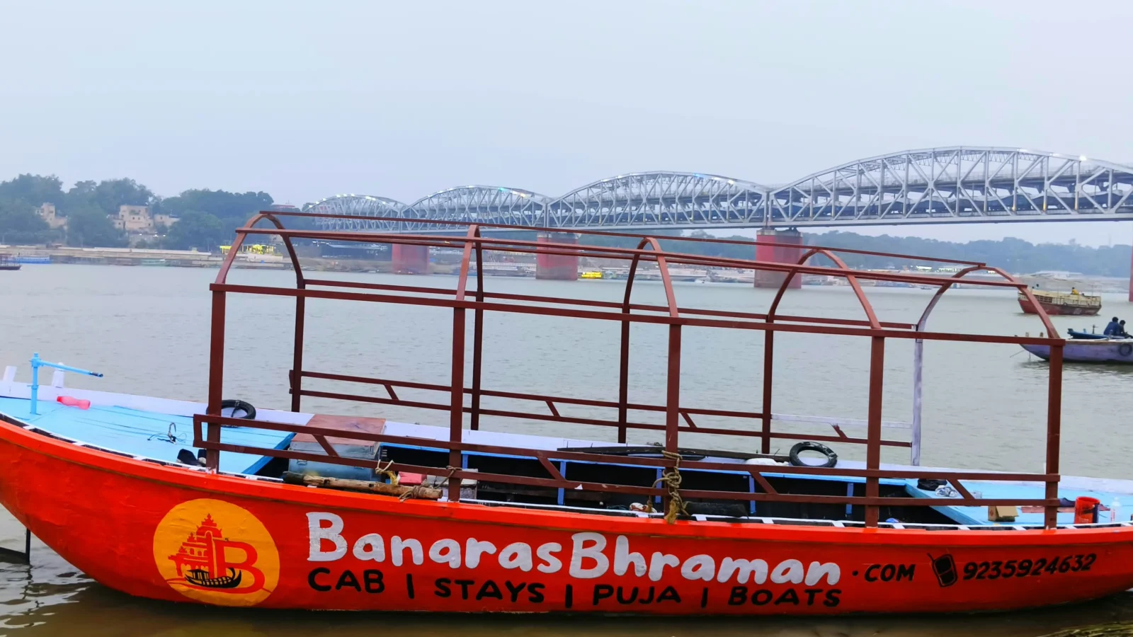 Dev Diwali boat ride in Varanasi with illuminated ghats and decorated Motor boat