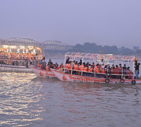 Dev Diwali boat ride in Varanasi with illuminated ghats and decorated cruise boats