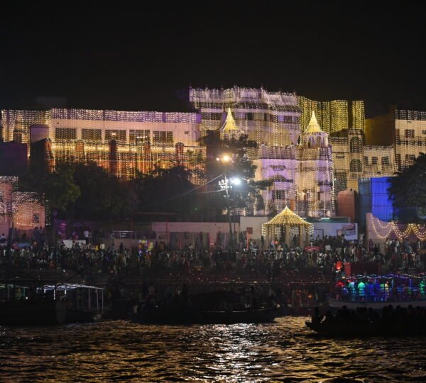 Evening boat ride passing the illuminated ghats of Varanasi