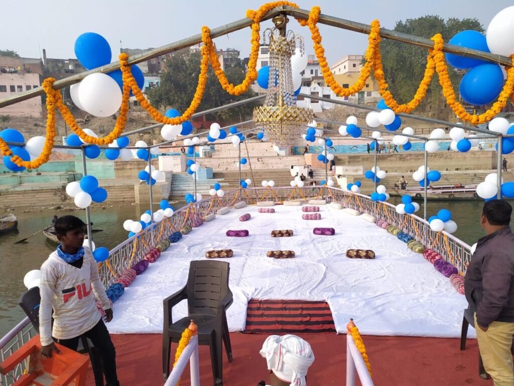 Private boat with flowers and lights for an anniversary event on the Ganga in Varanasi