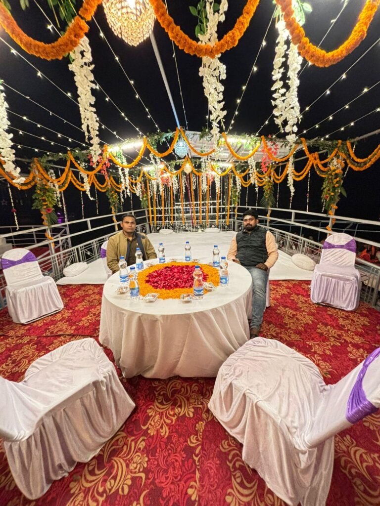 Beautifully lit bajra boat on the Ganges in Varanasi during Dev Diwali celebration with sparkling lights