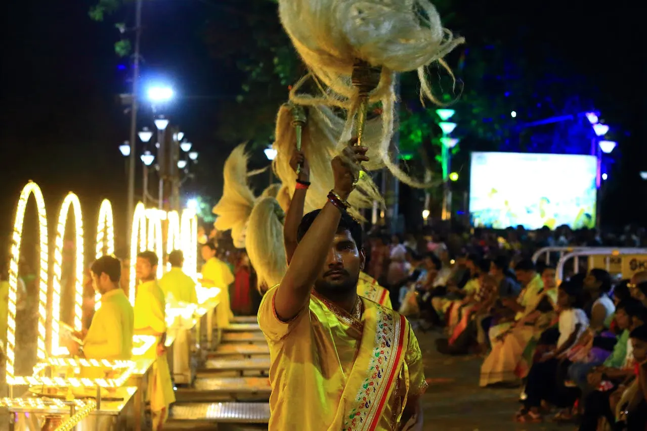 Priests performing Ganga Aarti with lights and rituals in Kashi Varanasi.