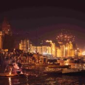 Dev Diwali boat booking in Varanasi with glowing diyas and spiritual Ganga view