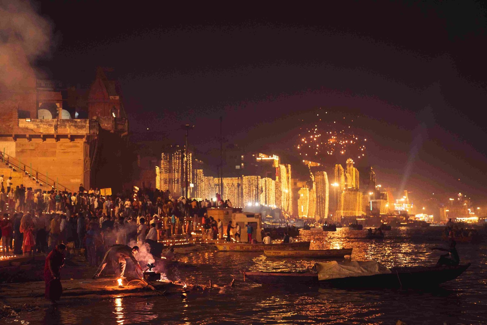 Dev Diwali boat booking in Varanasi with glowing diyas and spiritual Ganga view