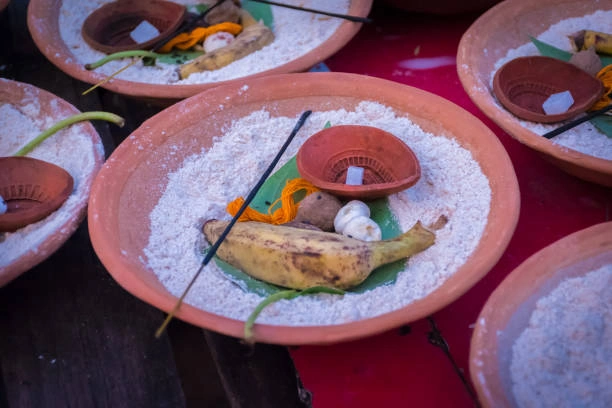 Traditional Pind Daan items used in Varanasi for Shradh rituals, including banana, diya, and til