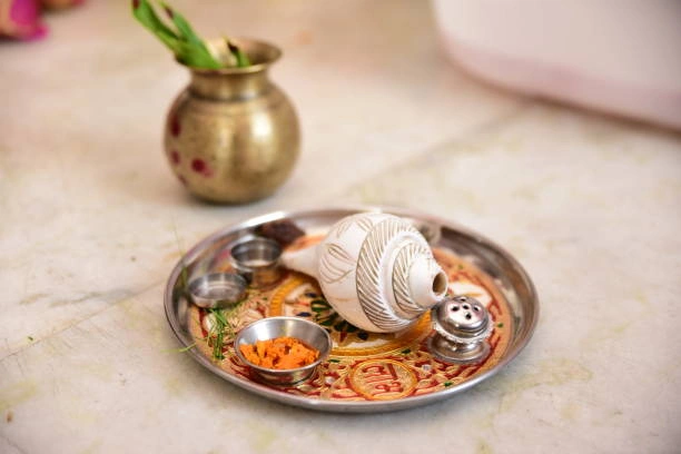 Puja thali with kalash and shankh used to remove Pitru Dosh and bring peace to ancestors